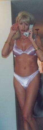 transvestite in white bra and panties