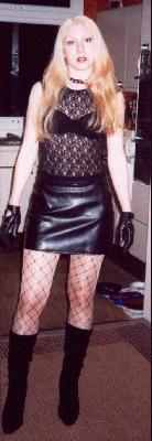 blonde bimbo wearing black leather miniskirt