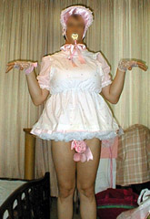 picture of white adult baby sissy dress and bonnet with pink bow on sissy cock