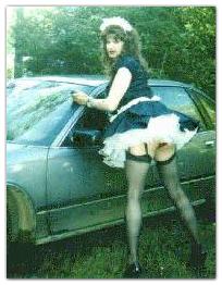 Sissy maid Gwen washes a car