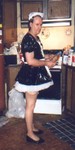 sissy maid works in kitchen